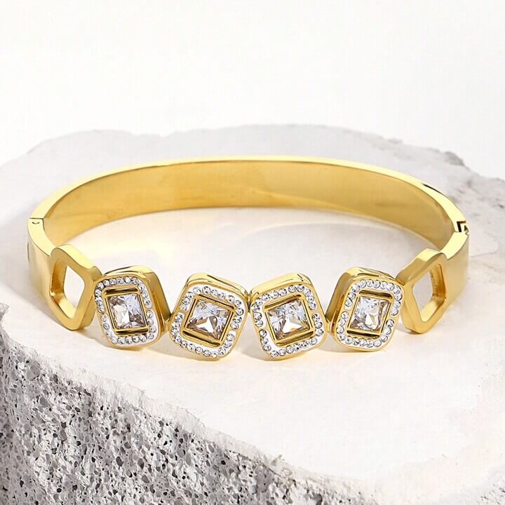 Zircon gold bangle