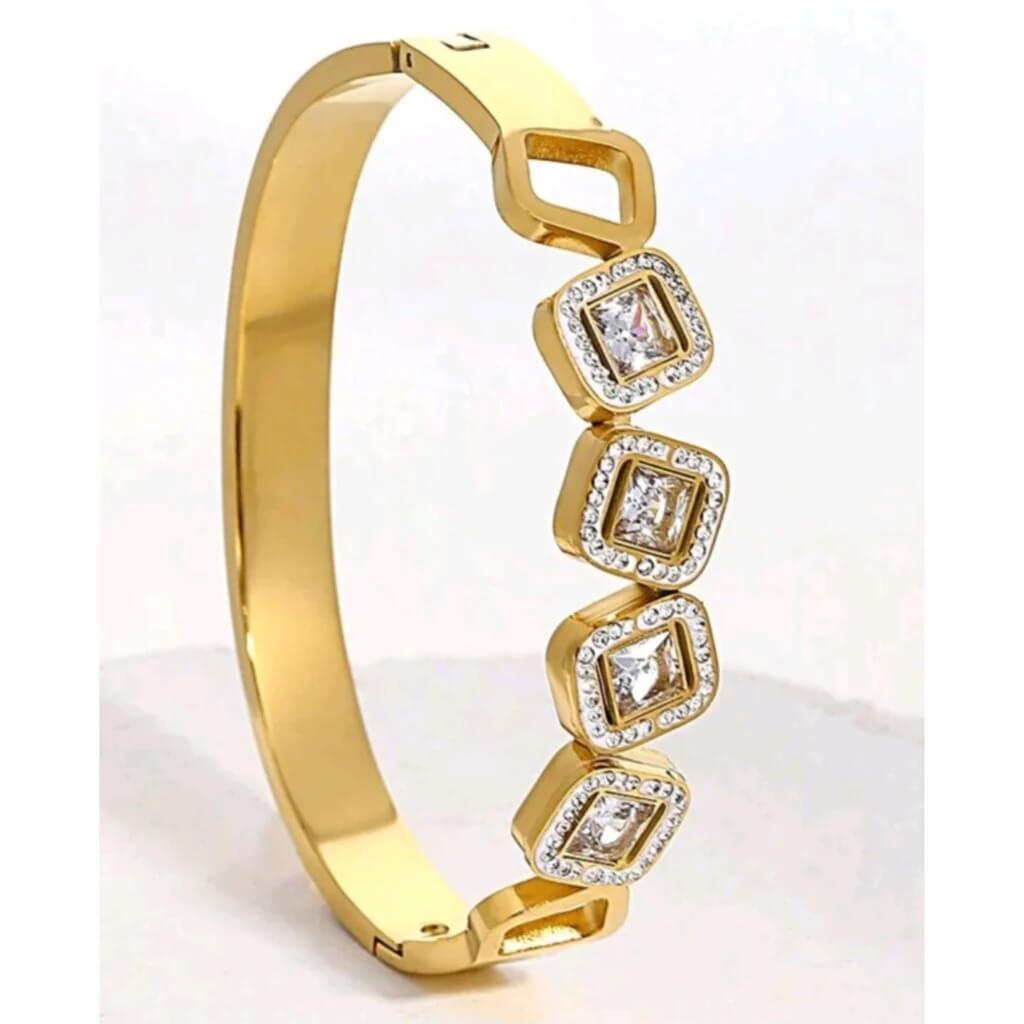 Zircon gold bangle