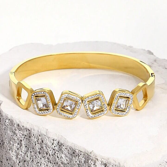 Zircon gold bangle